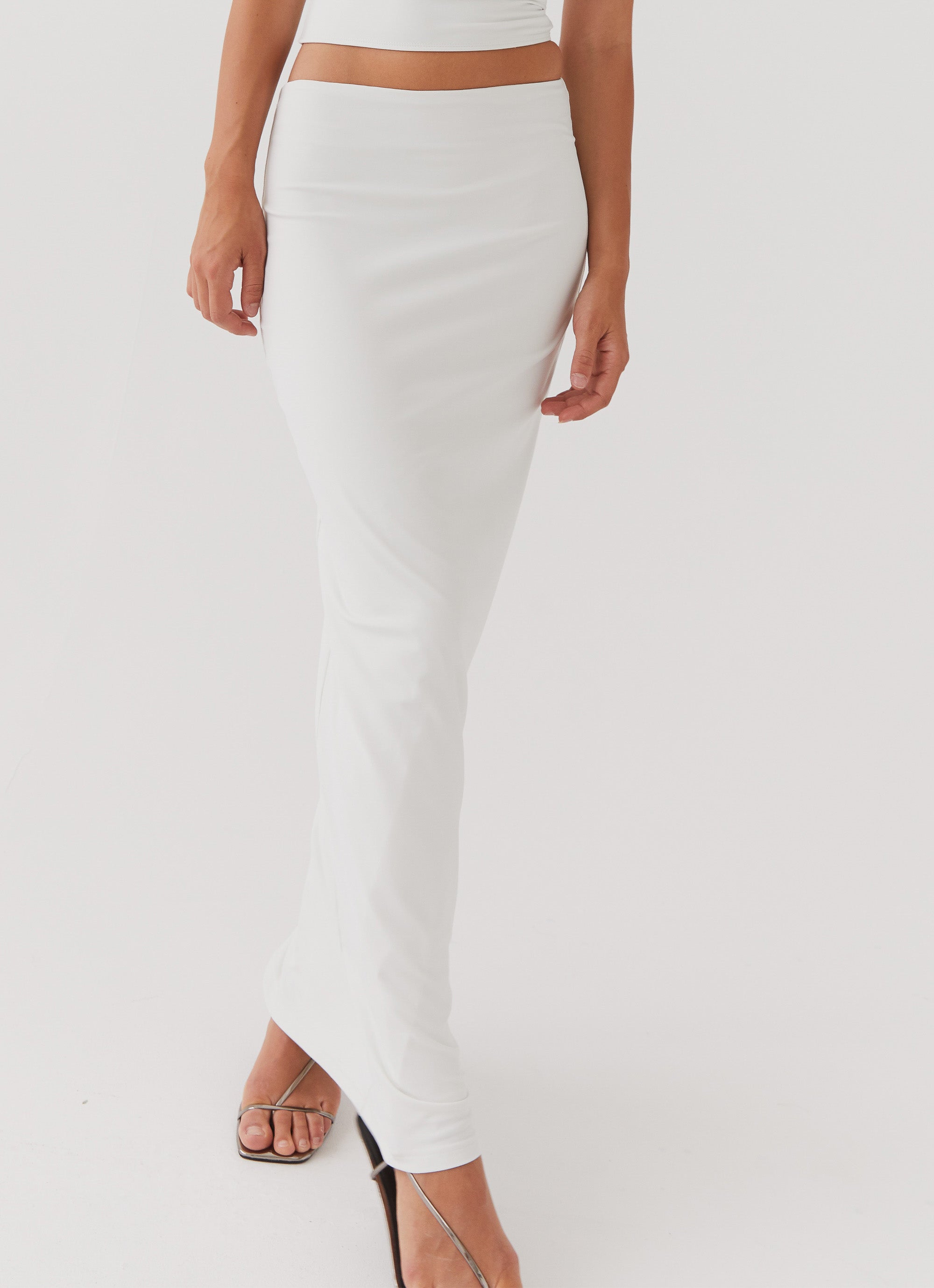 Womens Solace Soul Maxi Skirt in the colour Ivory in front of a light grey background