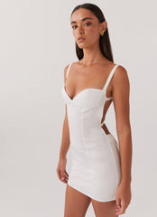 Womens Naomi Backless Mini Dress in the colour White in front of a light grey background