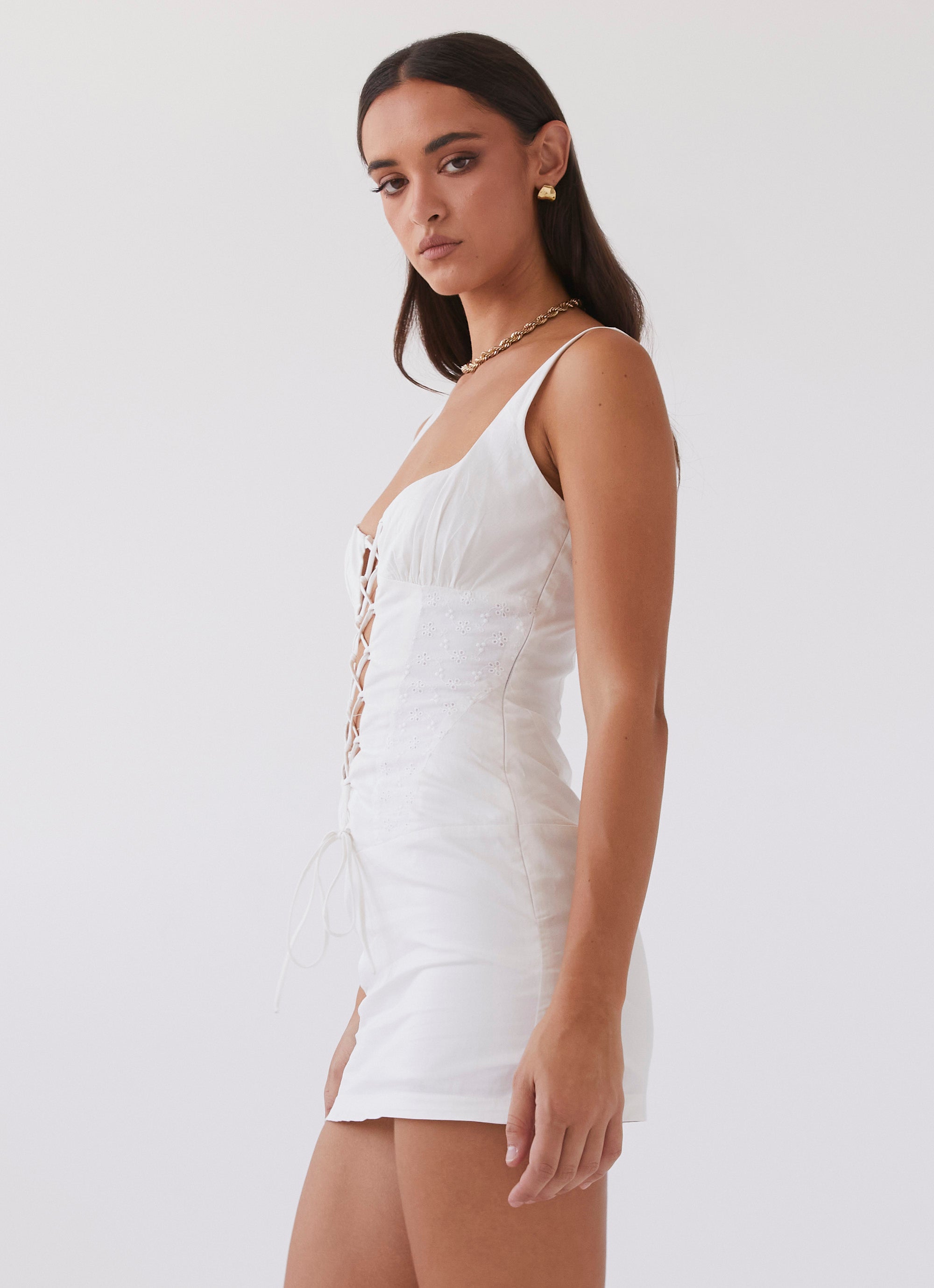Womens Casey Lace Up Mini Dress in the colour White in front of a light grey background