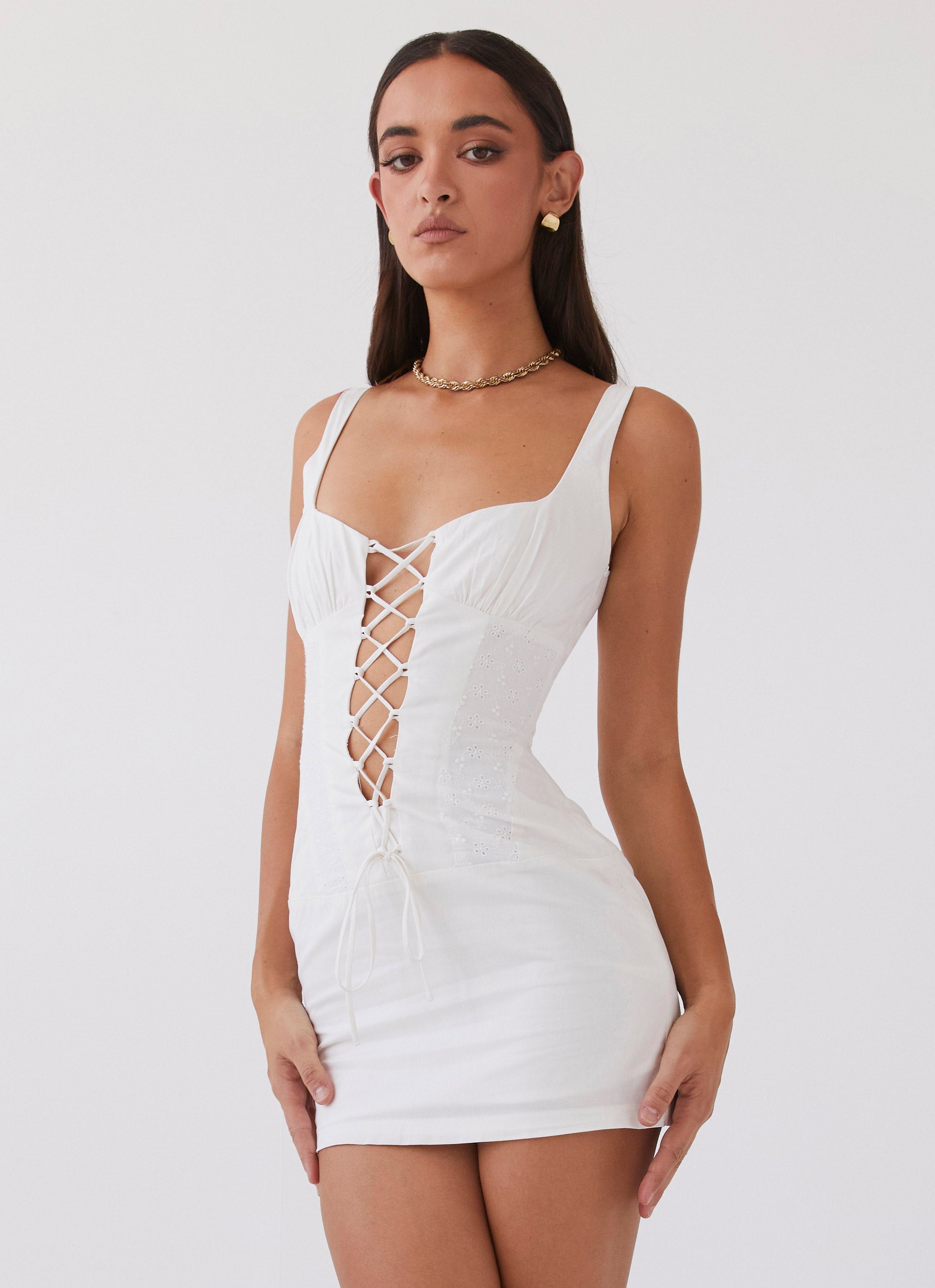 Womens Casey Lace Up Mini Dress in the colour White in front of a light grey background