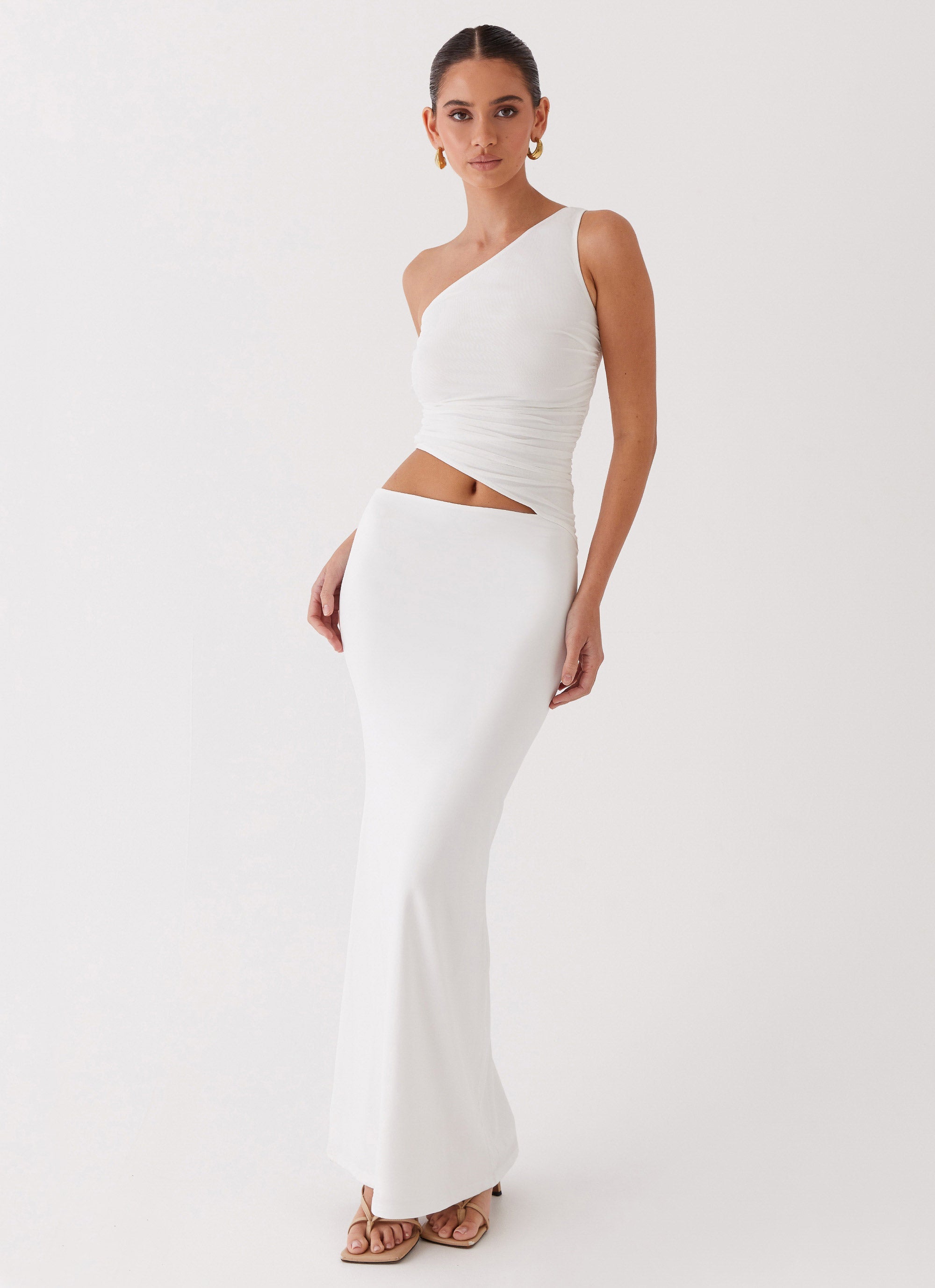 Womens Seranella One Shoulder Maxi Dress in the colour White in front of a light grey background