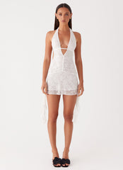 Womens Ritz Lace Mini Dress in the colour White in front of a light grey background