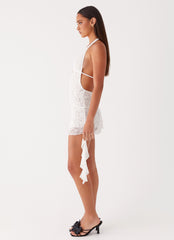 Womens Ritz Lace Mini Dress in the colour White in front of a light grey background