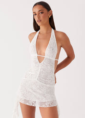 Womens Ritz Lace Mini Dress in the colour White in front of a light grey background