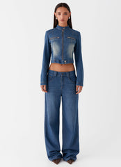 Womens Ride Elegant Baggy Jeans in the colour Vintage Blue Wash in front of a light grey background