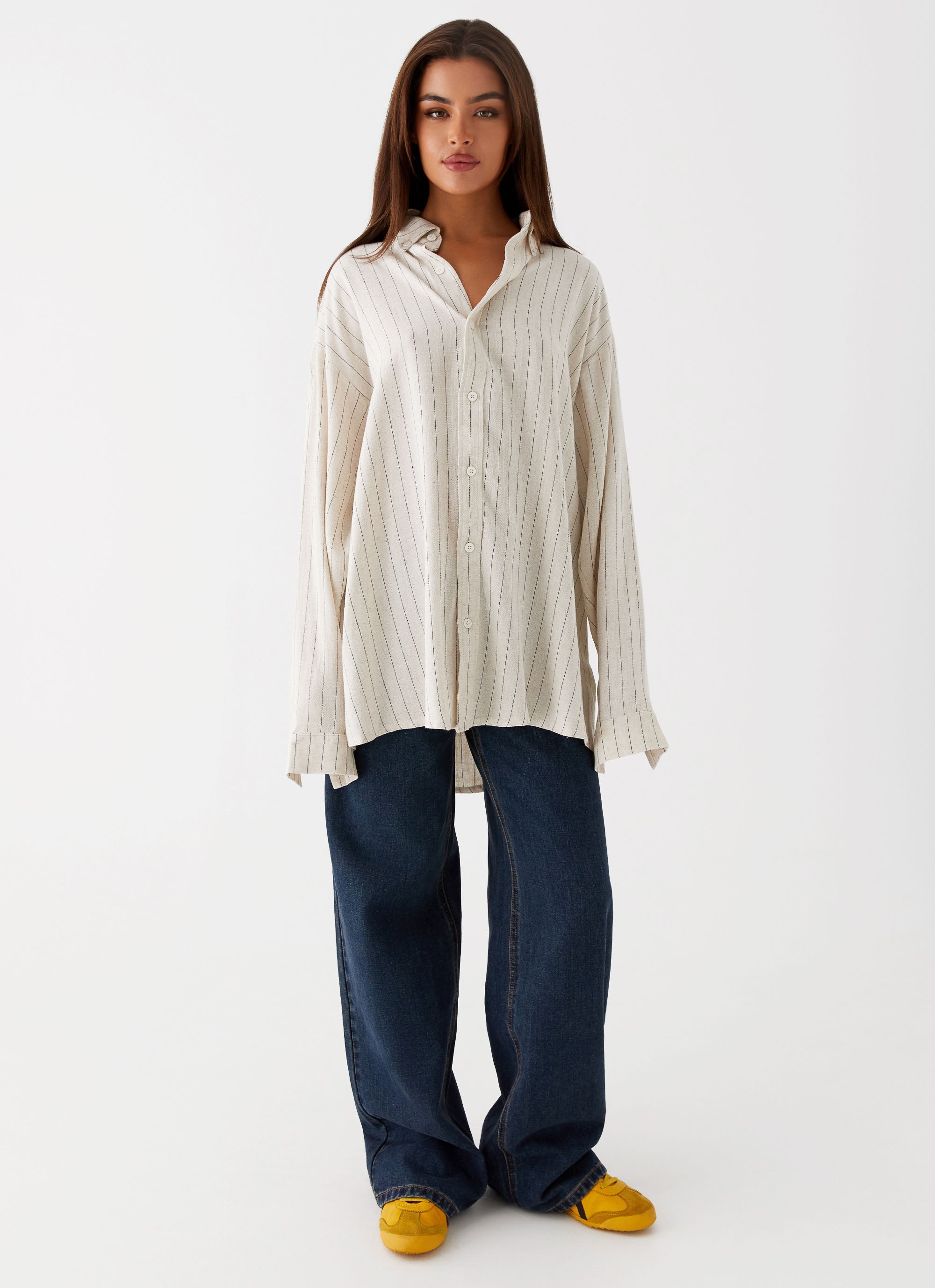 Womens Lockie Oversized Linen Shirt in the colour Oat Pinstripe in front of a light grey background