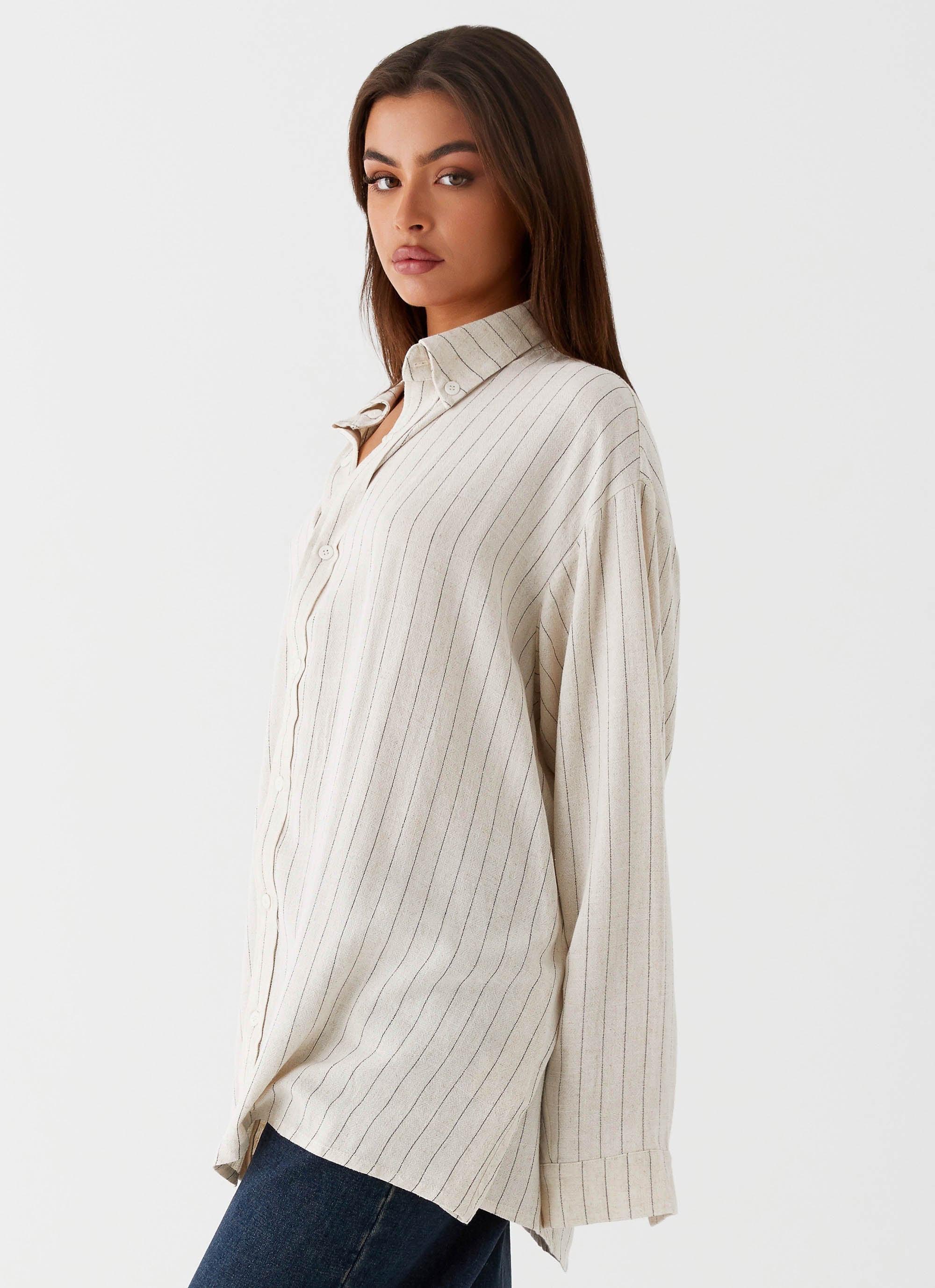 Womens Lockie Oversized Linen Shirt in the colour Oat Pinstripe in front of a light grey background