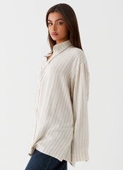 Womens Lockie Oversized Linen Shirt in the colour Oat Pinstripe in front of a light grey background