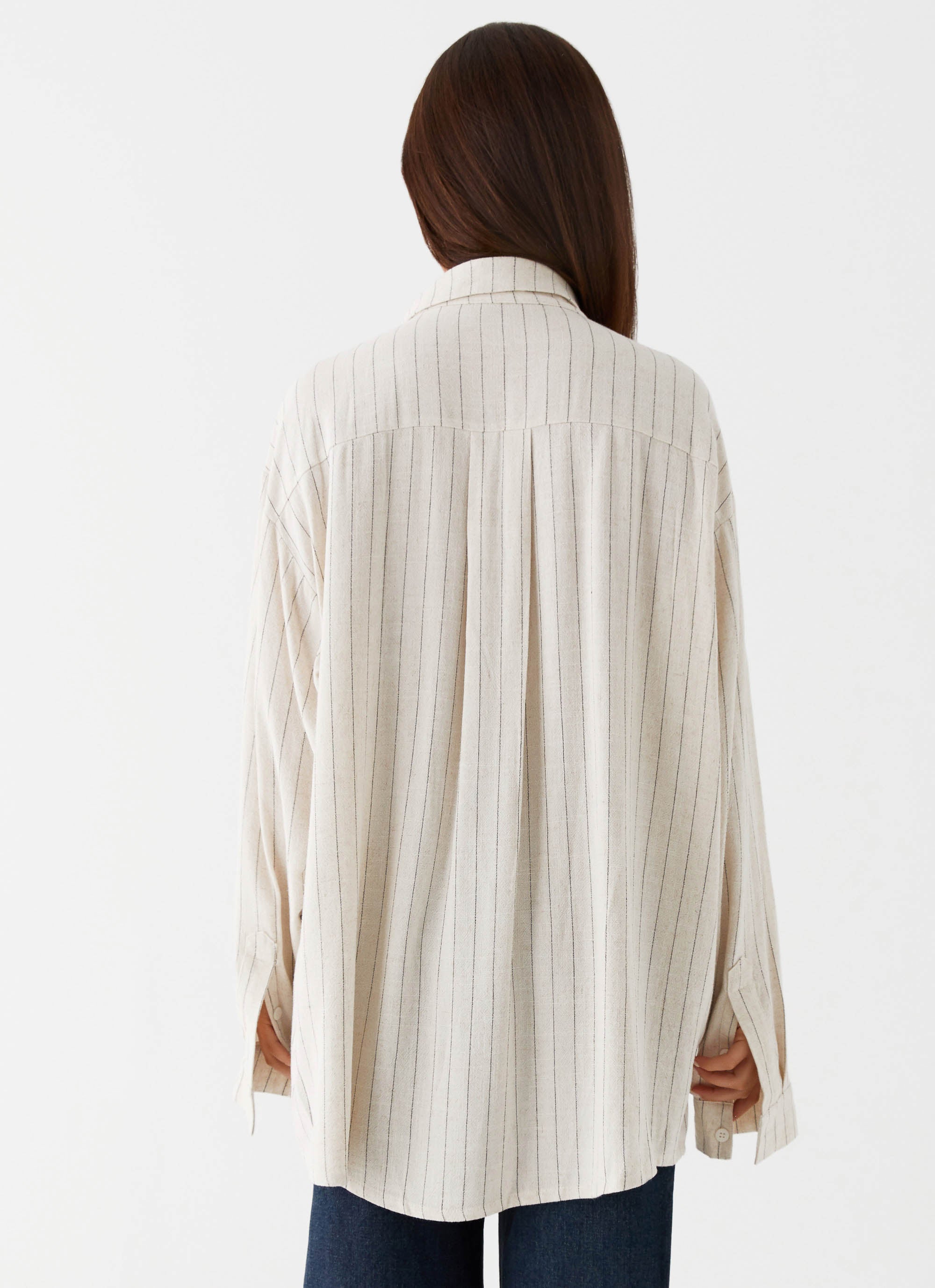 Womens Lockie Oversized Linen Shirt in the colour Oat Pinstripe in front of a light grey background