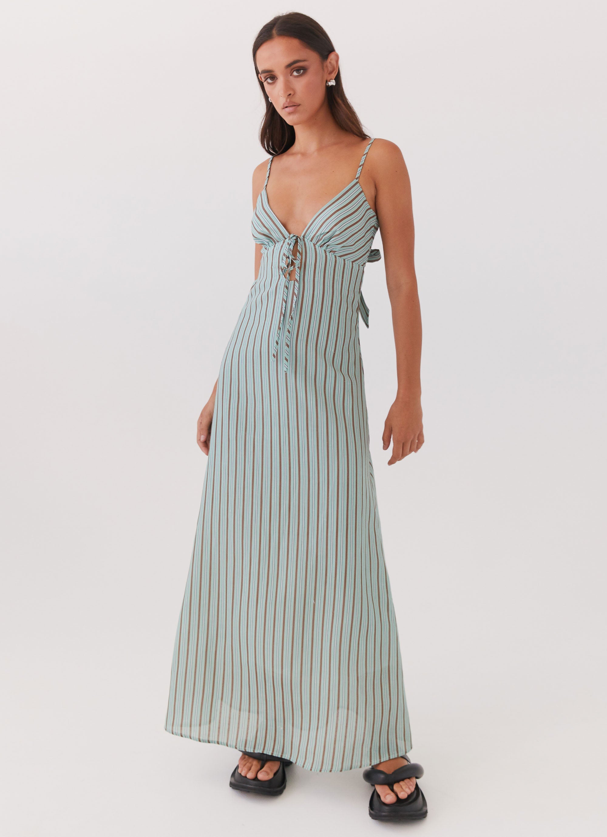 Womens Flora Linen Maxi Dress in the colour Coastal Stripe in front of a light grey background