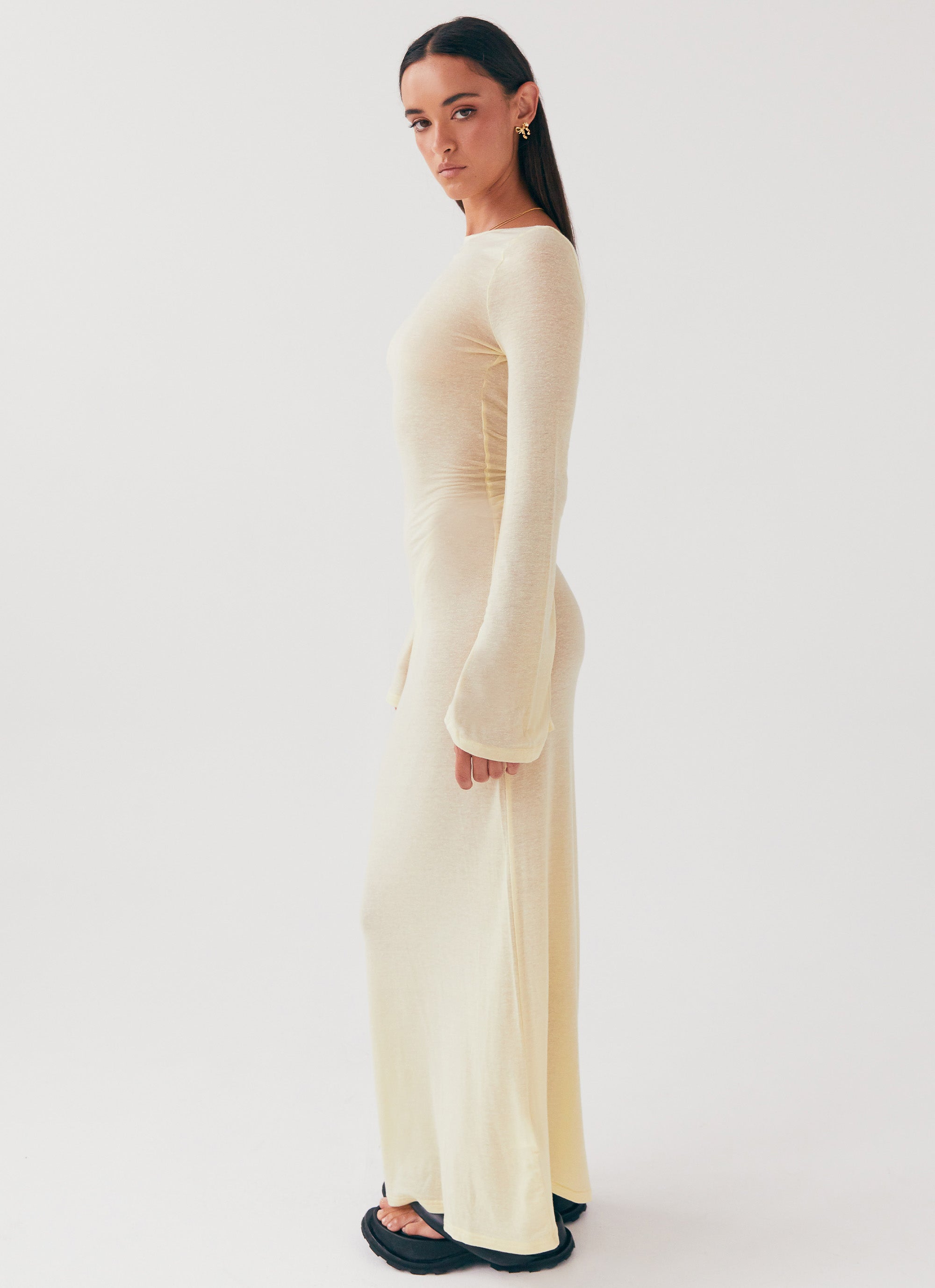 Womens Olivia Long Sleeve Maxi Dress in the colour Lemon in front of a light grey background