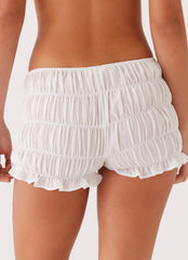 Womens Girls Like Us Ruched Mini Shorts in the colour White in front of a light grey background