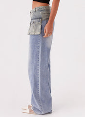 Womens West Coast Denim Belt in the colour Indigo in front of a light grey background