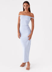 Womens Arabella Twist Shoulder Maxi Dress in the colour Blue in front of a light grey background