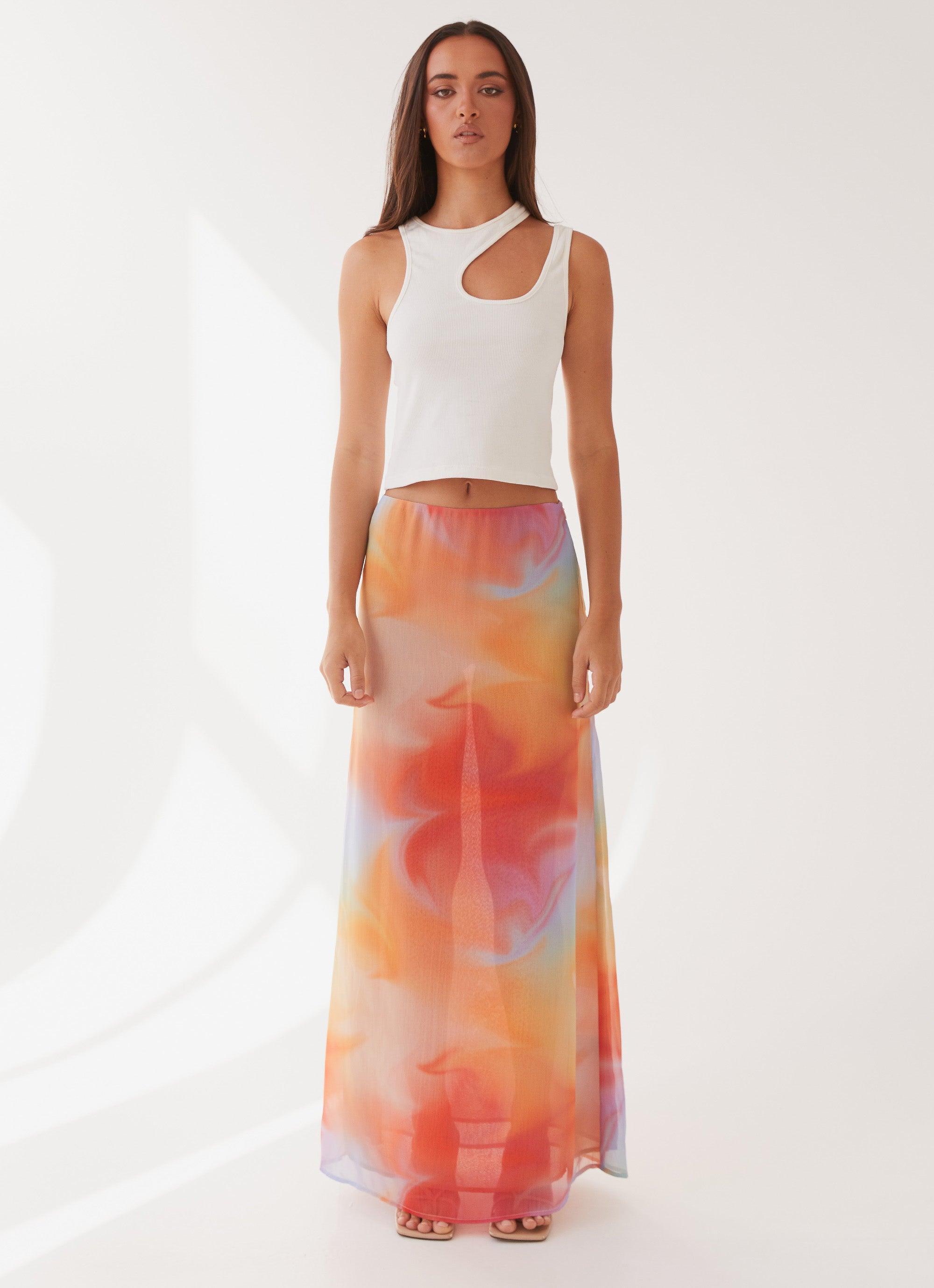 Womens Sunlight Cascade Maxi Skirt in the colour Rainbow Radiance in front of a light grey background