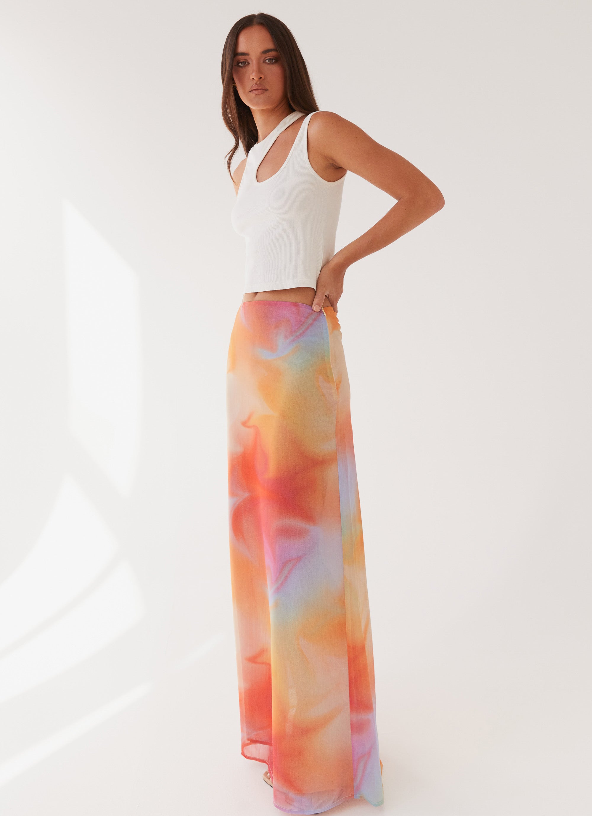 Womens Sunlight Cascade Maxi Skirt in the colour Rainbow Radiance in front of a light grey background