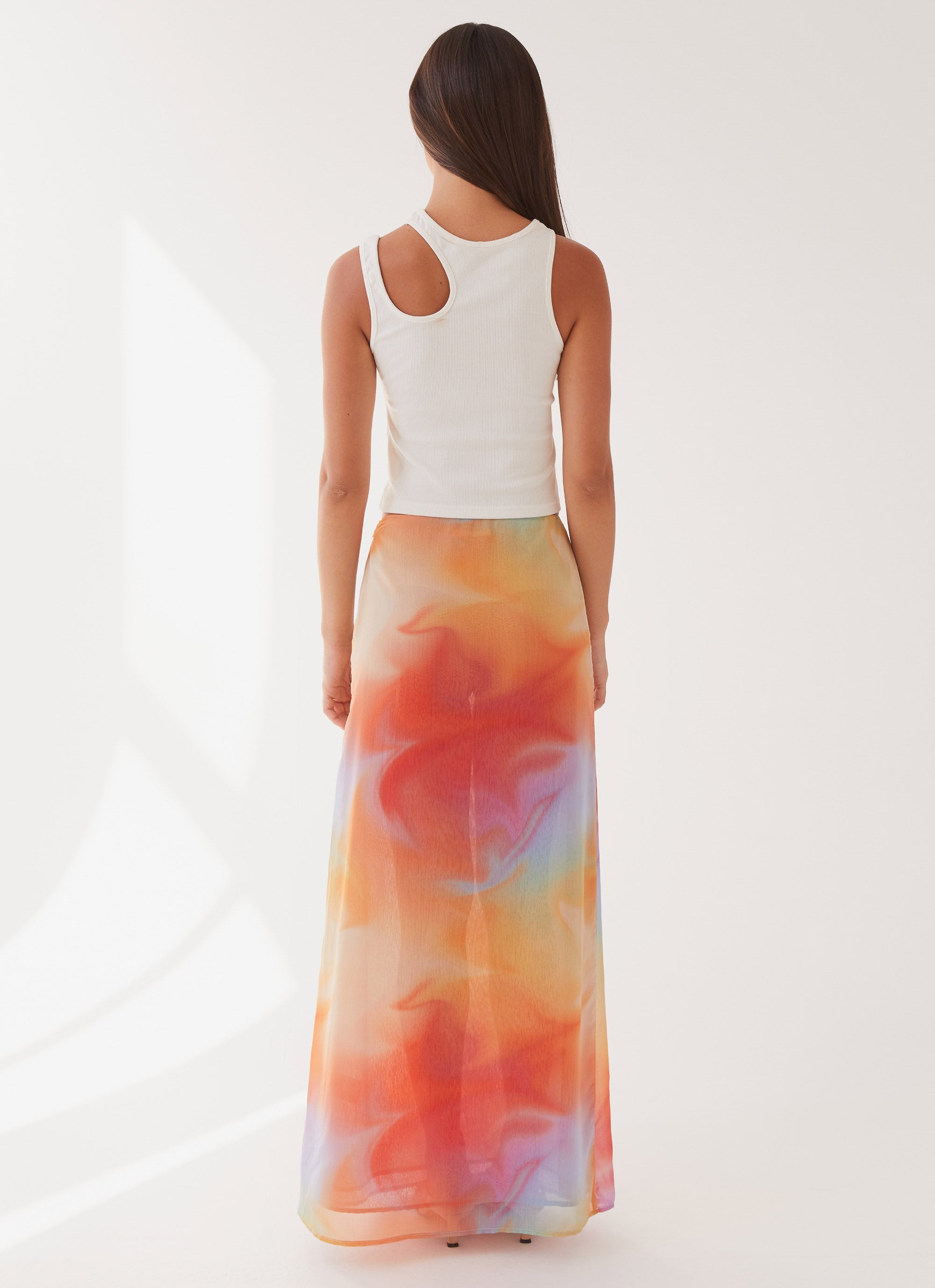 Womens Sunlight Cascade Maxi Skirt in the colour Rainbow Radiance in front of a light grey background