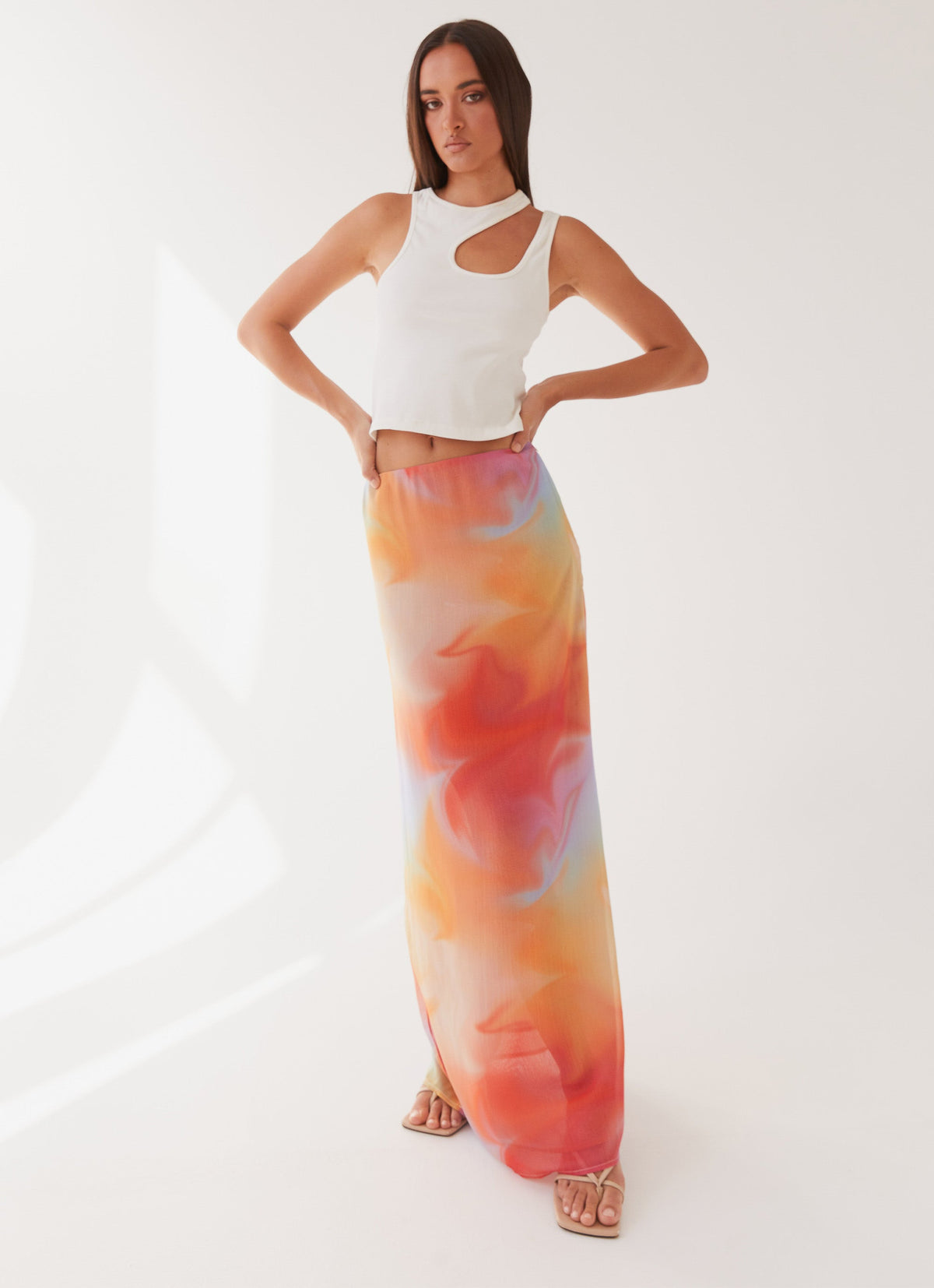 Womens Sunlight Cascade Maxi Skirt in the colour Rainbow Radiance in front of a light grey background