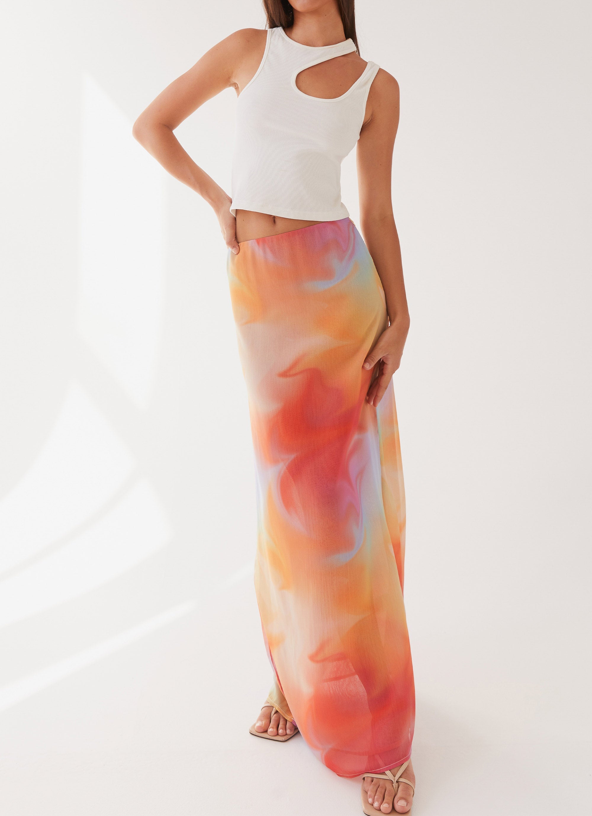 Womens Sunlight Cascade Maxi Skirt in the colour Rainbow Radiance in front of a light grey background
