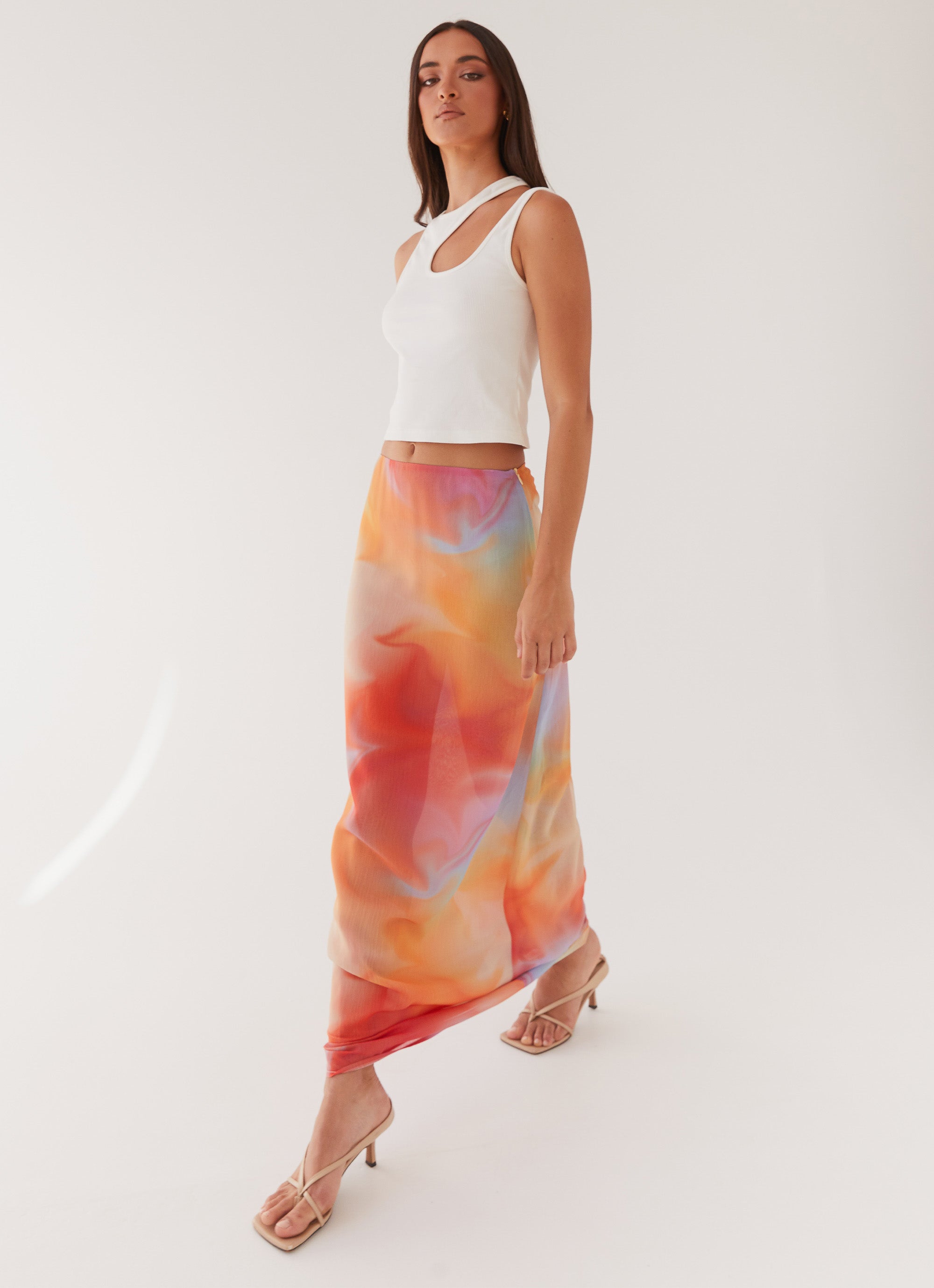 Womens Sunlight Cascade Maxi Skirt in the colour Rainbow Radiance in front of a light grey background