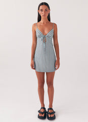 Womens Flora Linen Mini Dress in the colour Coastal Stripe in front of a light grey background