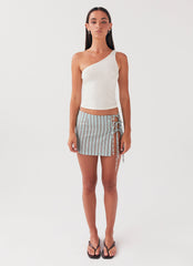 Womens Summer Retreat Mini Skirt in the colour Coastal Stripe in front of a light grey background