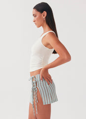 Womens Summer Retreat Mini Skirt in the colour Coastal Stripe in front of a light grey background