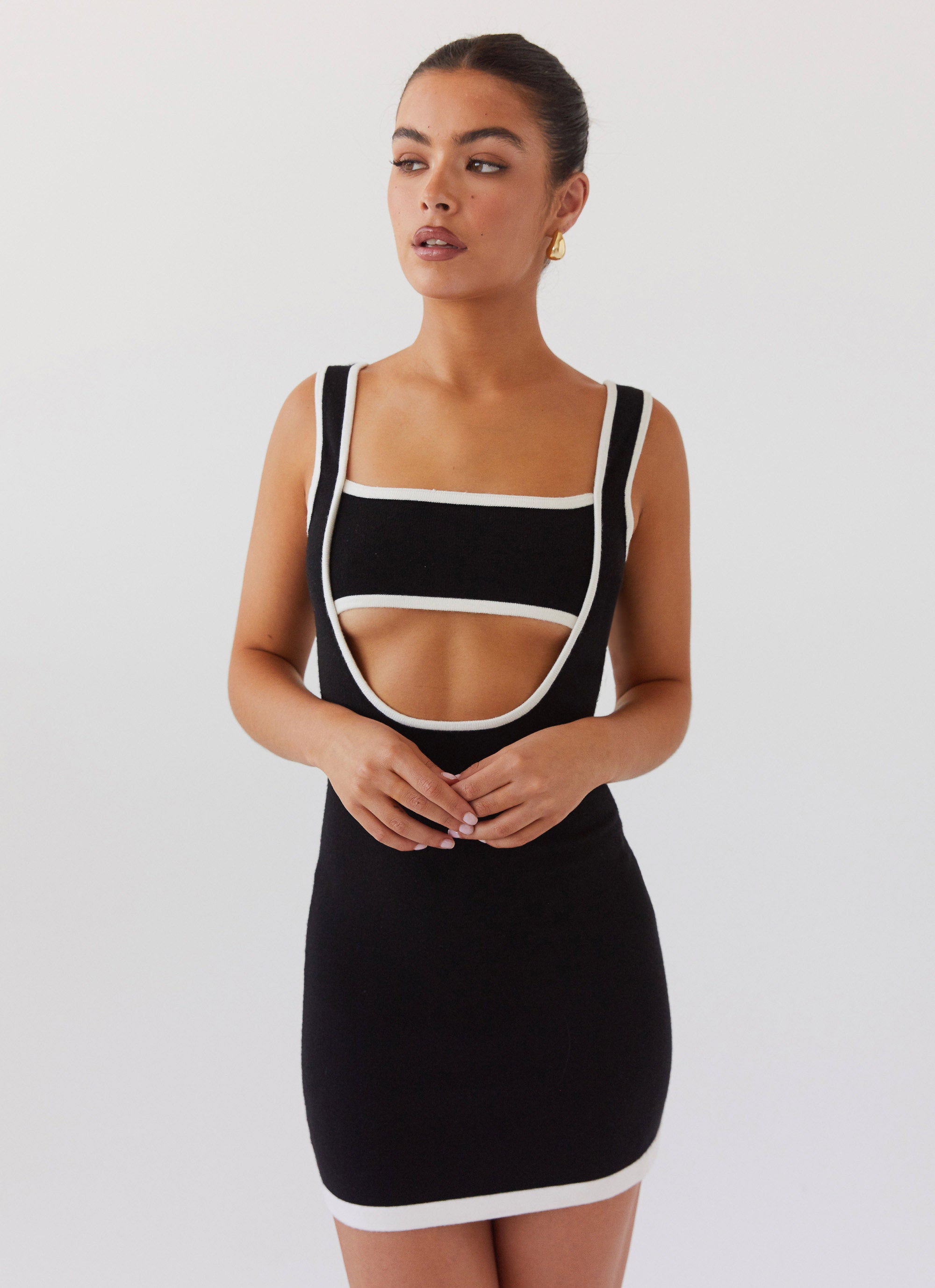 Womens Lost In Paris Knit Mini Dress in the colour Black in front of a light grey background