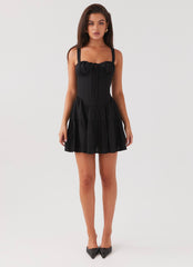 Womens Lucie Linen Mini Dress in the colour Black in front of a light grey background
