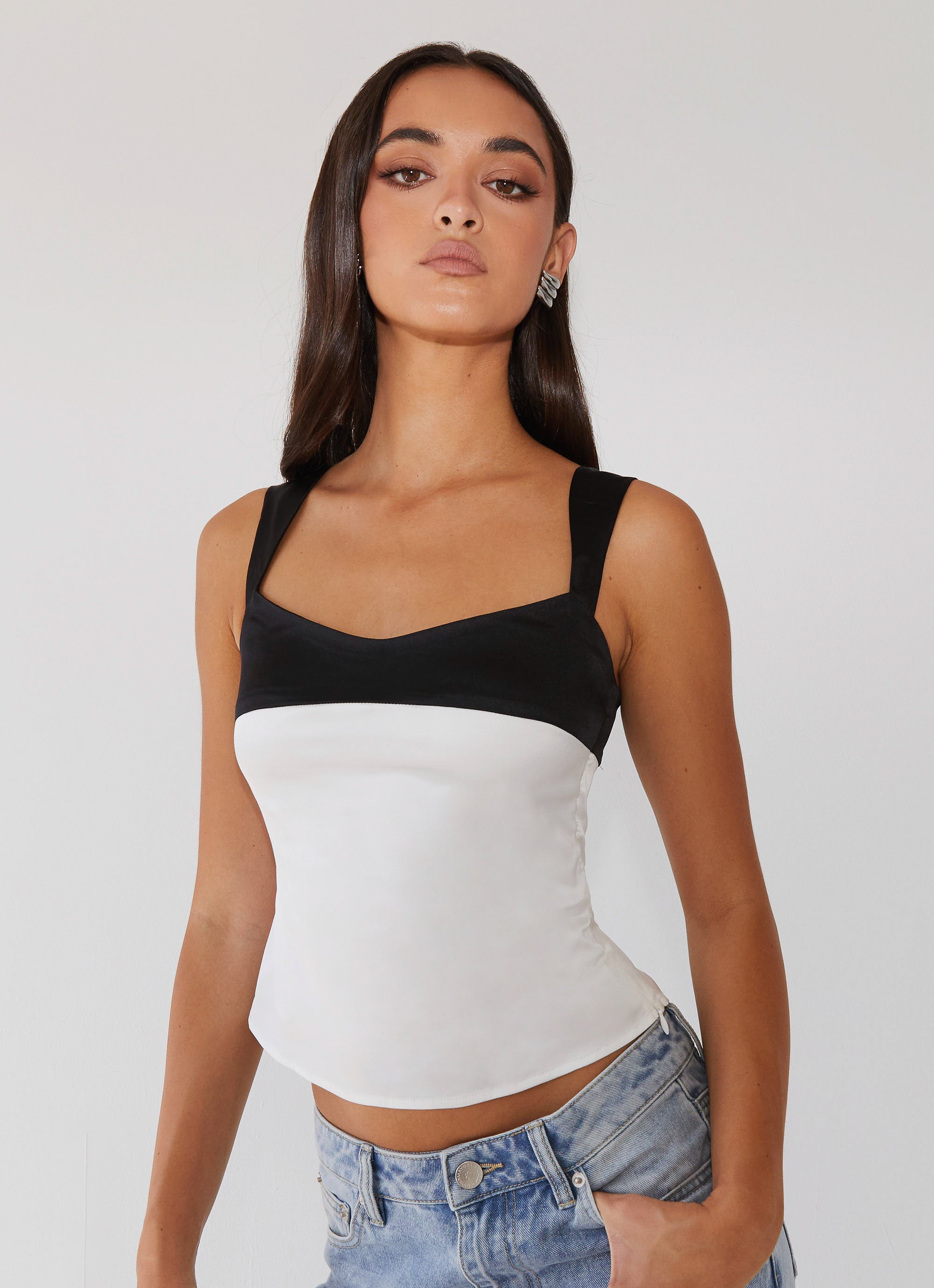 Womens Lylah Satin Top in the colour Noir Pearl in front of a light grey background