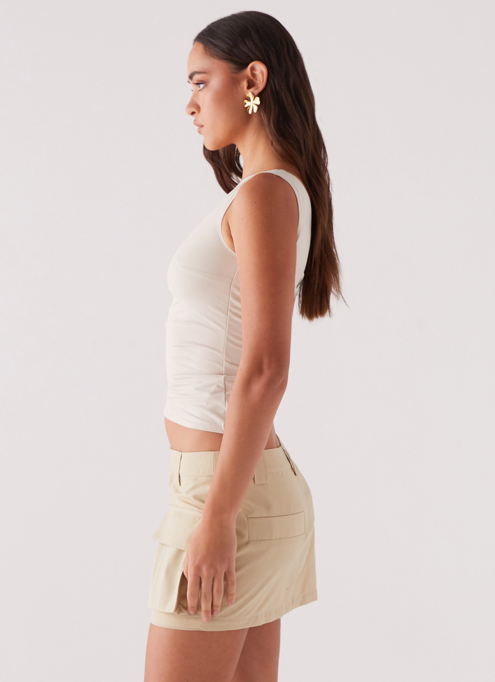Womens Heart To Heart Cargo Mini Skirt in the colour Beige in front of a light grey background