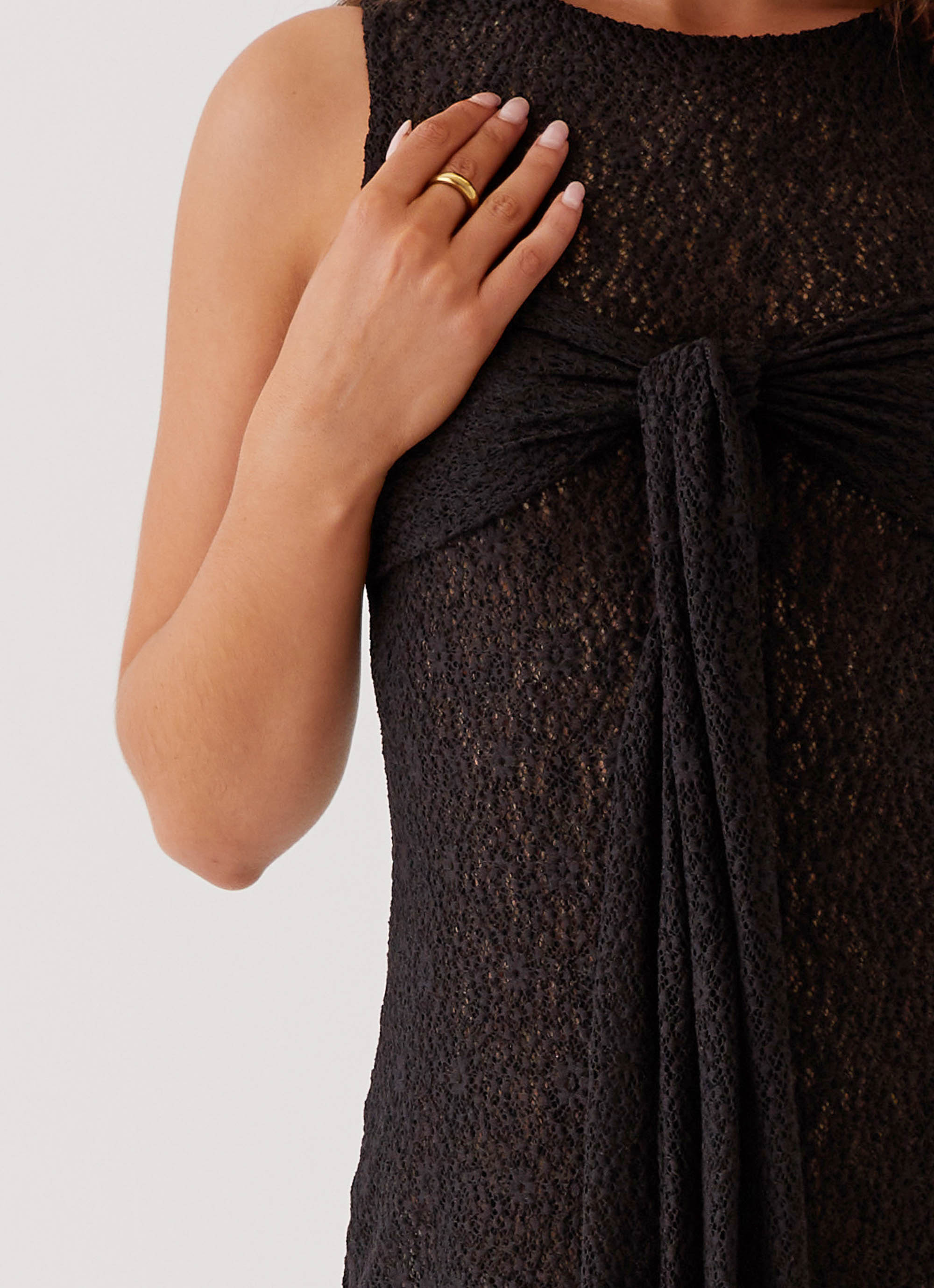 Womens Midnight Muse Lace Mini Dress in the colour Black in front of a light grey background