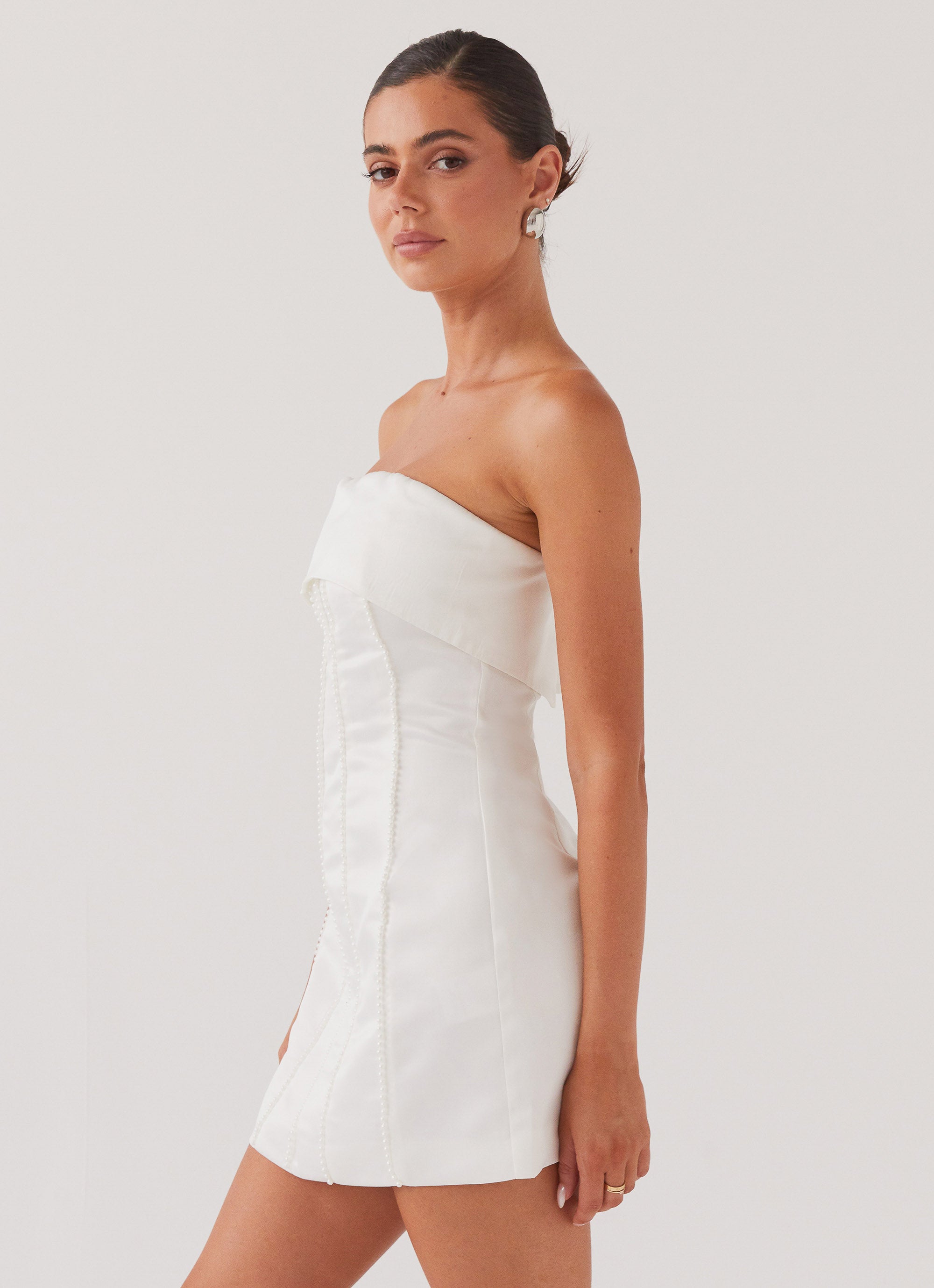 Womens Bombshell Tube Mini Dress in the colour White Pearl in front of a light grey background