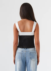 Womens Lylah Satin Top in the colour Onyx in front of a light grey background