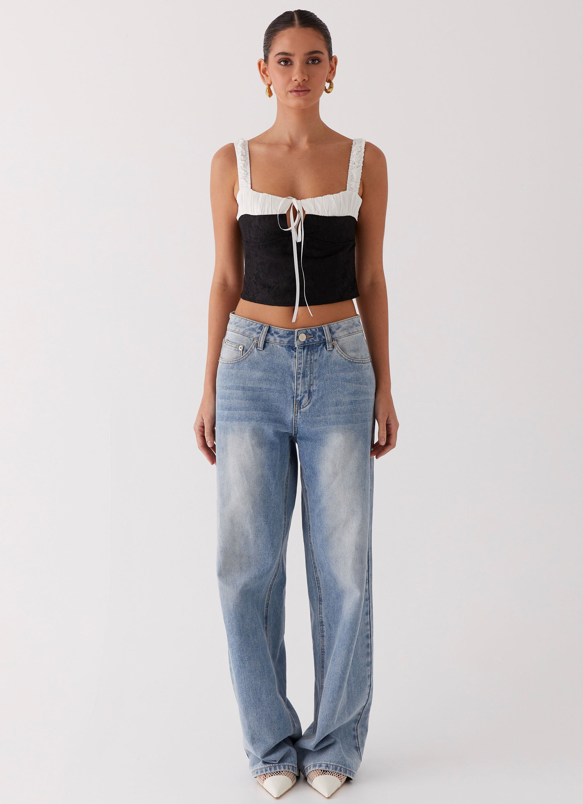 Womens Ryder Bustier Top in the colour Black in front of a light grey background