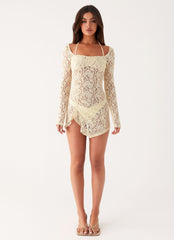 Womens Rarri Lace Mini Dress in the colour Ivory in front of a light grey background