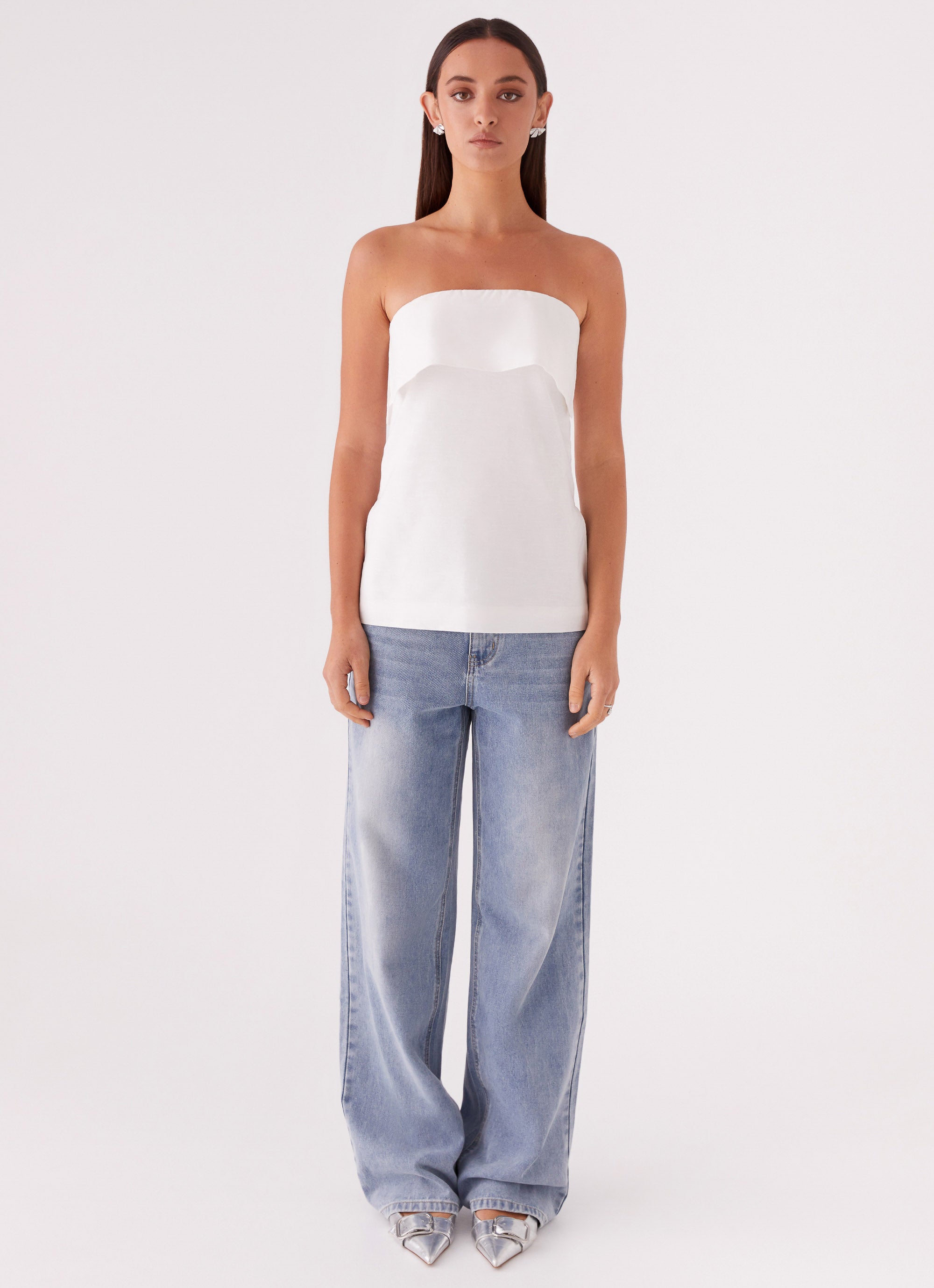 Womens Dalmia Linen Top in the colour White in front of a light grey background