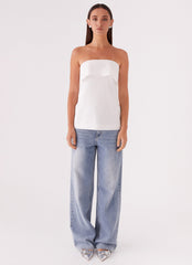 Womens Dalmia Linen Top in the colour White in front of a light grey background