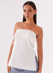 Womens Dalmia Linen Top in the colour White in front of a light grey background