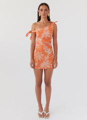 Womens Amazonia Linen Mini Dress in the colour Tropic Sunset in front of a light grey background