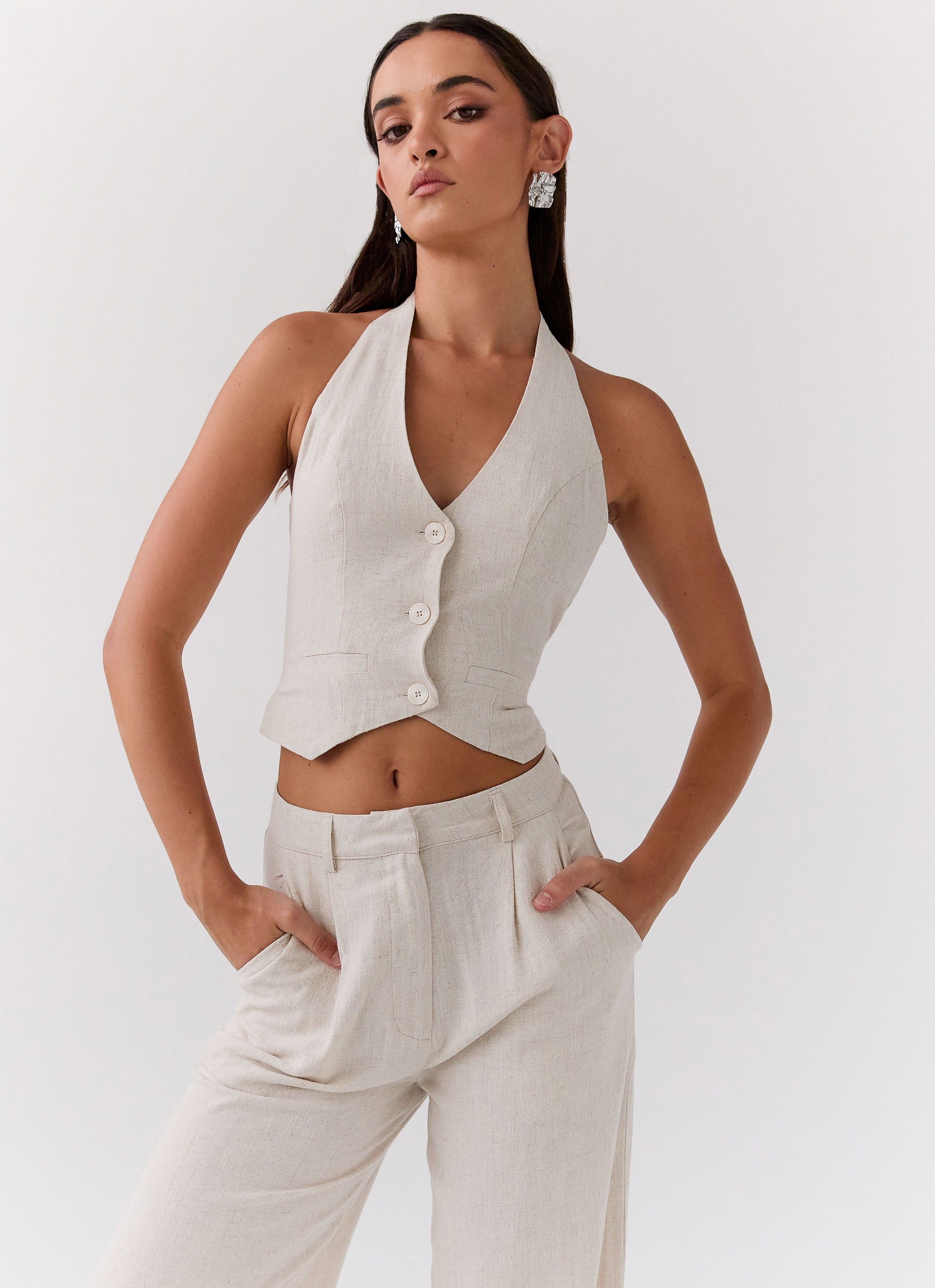 Womens Ambrosa Halterneck Linen Vest in the colour Oatmeal in front of a light grey background