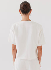 Womens Hacienda Linen Short Sleeve Blazer in the colour White in front of a light grey background