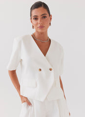 Womens Hacienda Linen Short Sleeve Blazer in the colour White in front of a light grey background