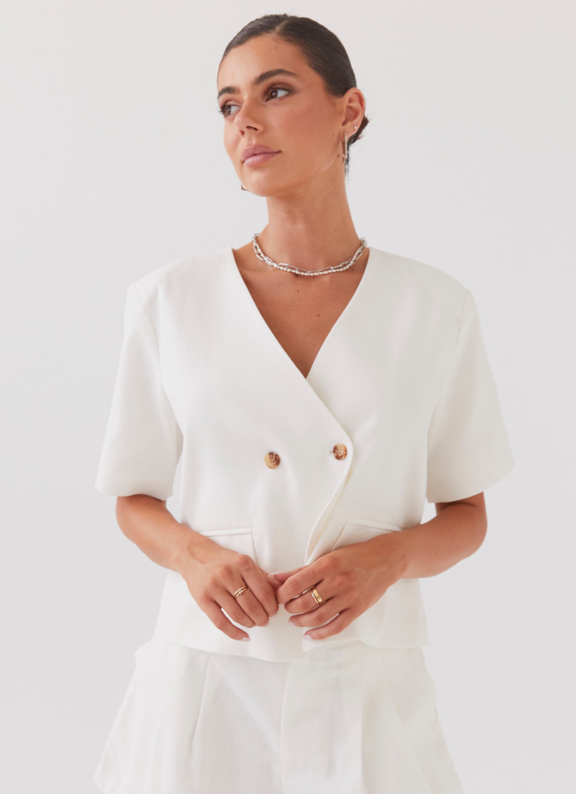 Womens Hacienda Linen Short Sleeve Blazer in the colour White in front of a light grey background