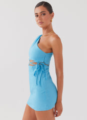 Womens Memini One Shoulder Linen Mini Dress in the colour Azure in front of a light grey background