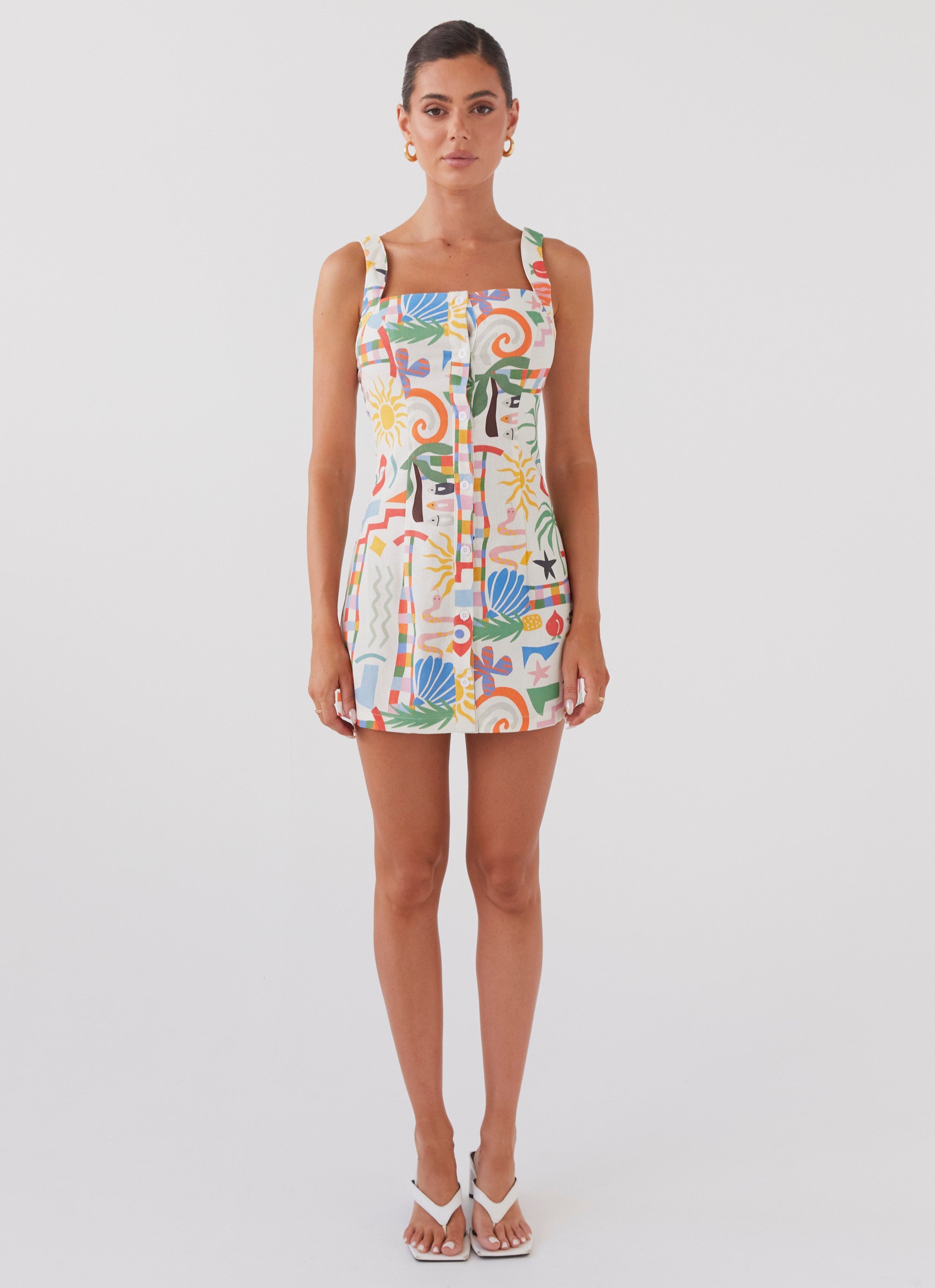 Womens Tori Linen Mini Dress in the colour Summer Palm in front of a light grey background