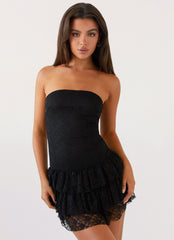Womens Posie Lace Tube Mini Dress in the colour Black in front of a light grey background