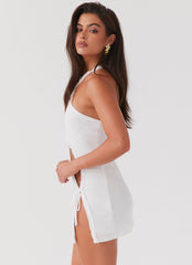 Womens Midnight Rhapsody Ruffle Mini Dress in the colour White in front of a light grey background