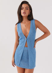 Womens Capri Glow Knit Top in the colour Azure in front of a light grey background