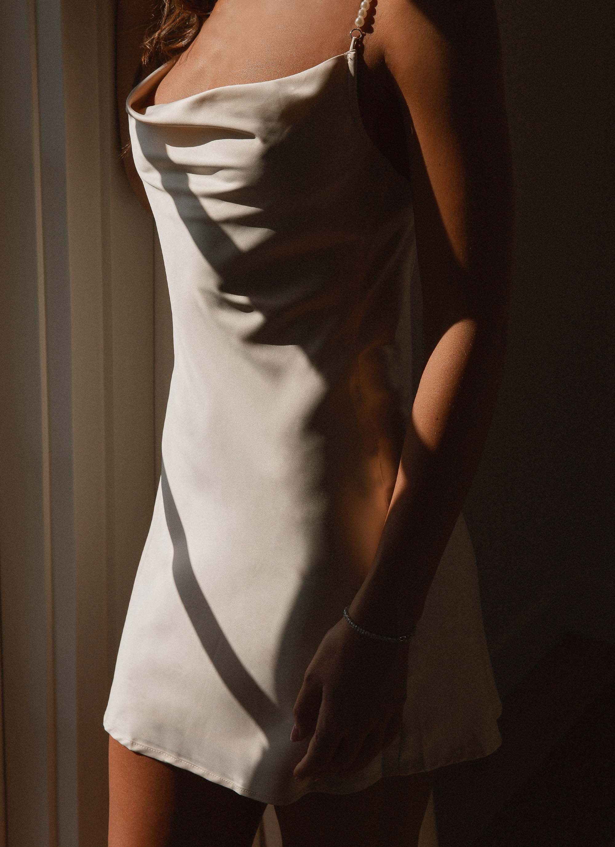 Womens Here We Go Satin Mini Dress in the colour Pearl in front of a light grey background